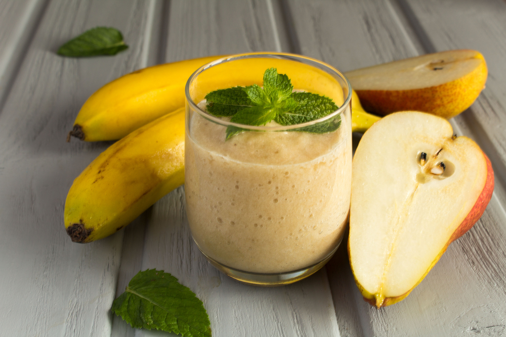 Smoothie,,Bananas,And,Pear,On,The,Grey,Background